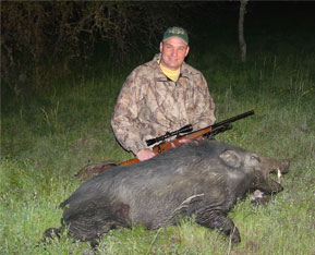 hunter with hog